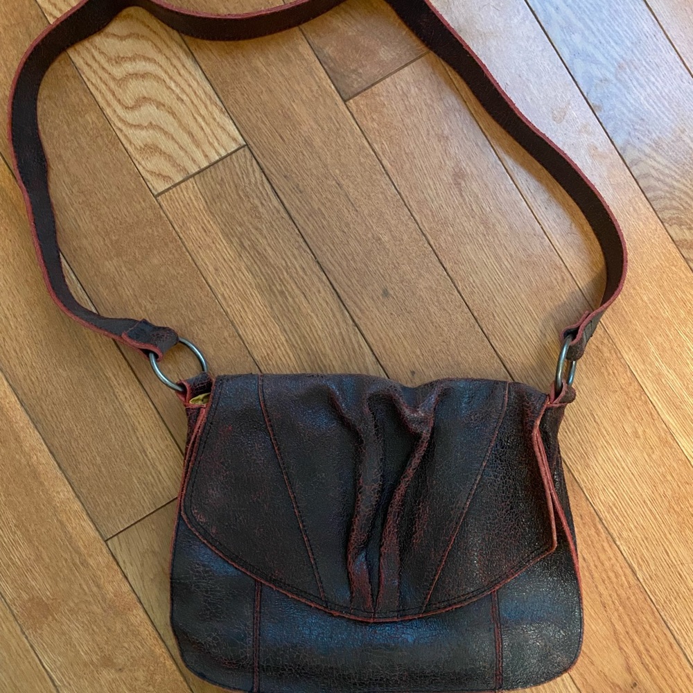 Red leather crossbody bag.
